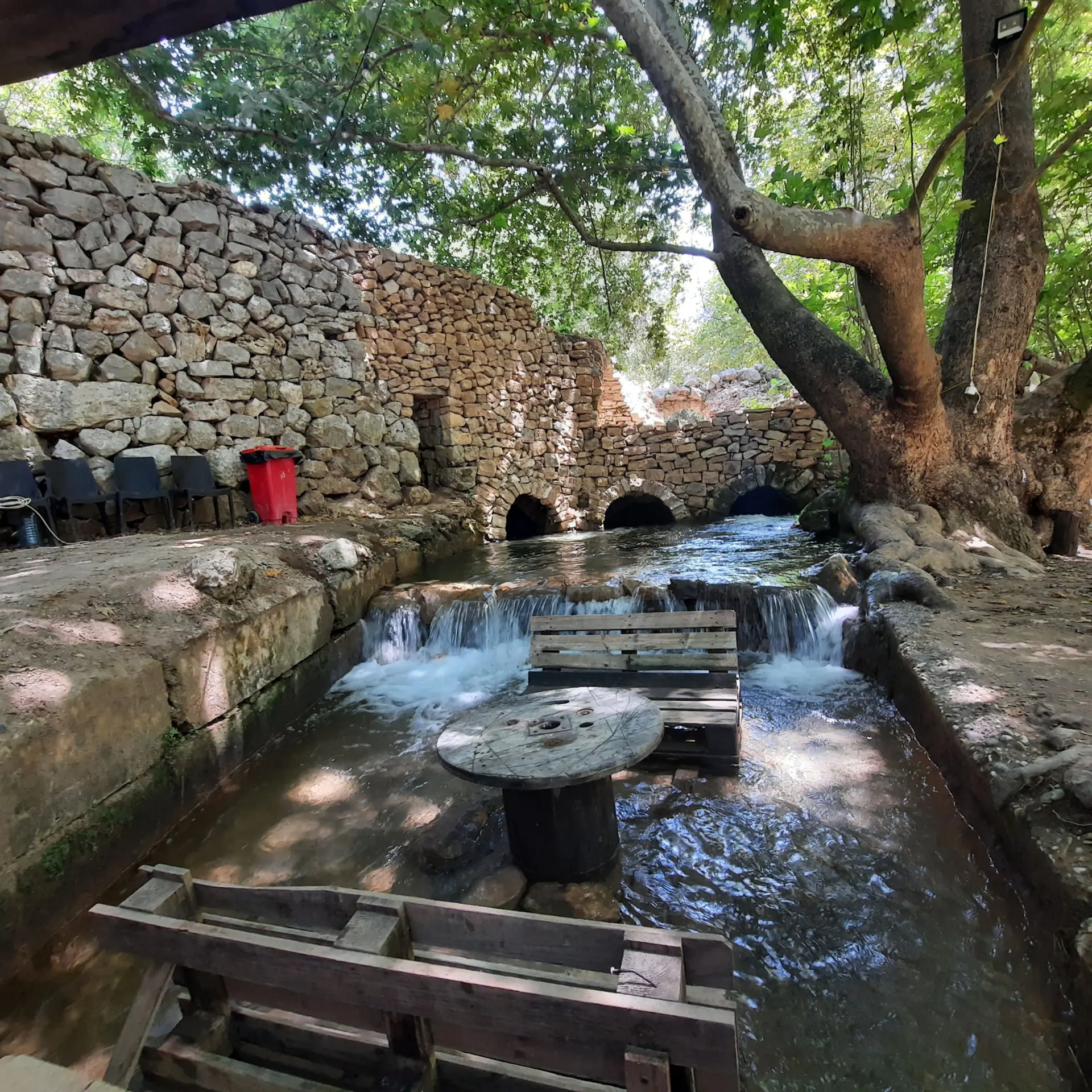 Stone water mill and stream in a Lebanese village